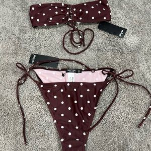 Nasty Gal bikini brand new with tags! Bottoms size 8 and top size 4.